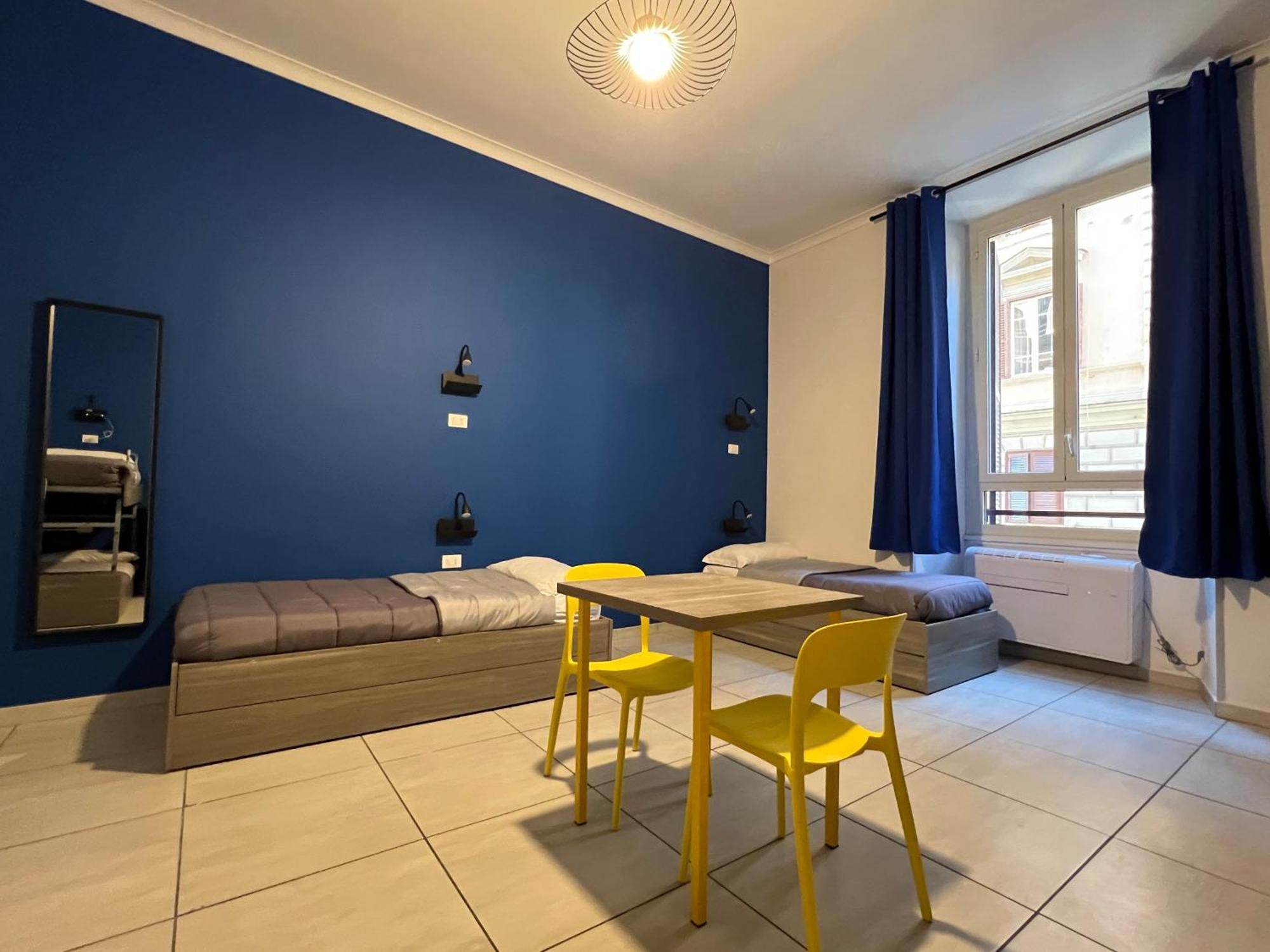 Posto Letto in Dormitorio Misto con 6 Letti e Bagno Esterno in Comune