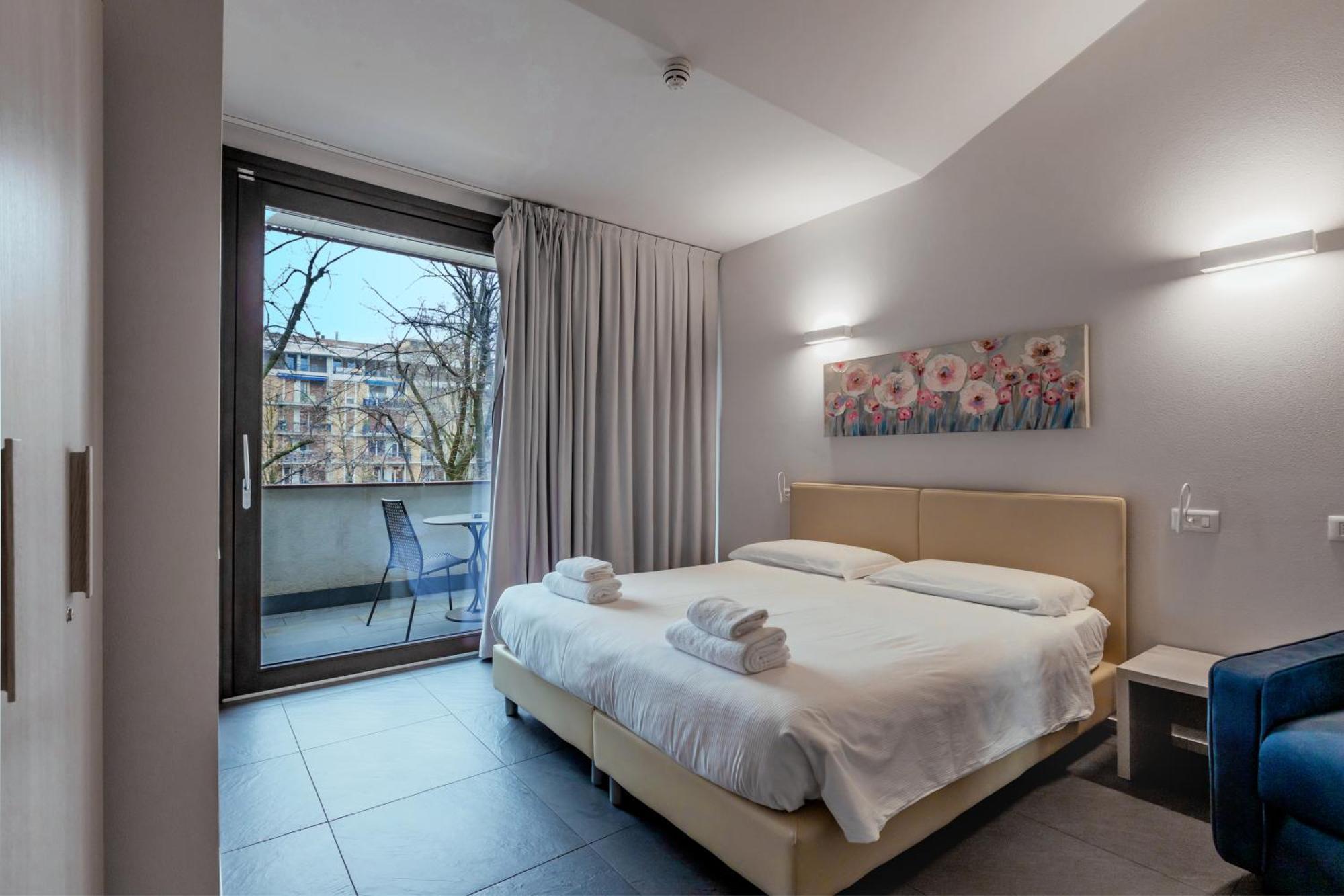 Doppel- oder Zweibettzimmer mit Balkon und eigenem Bad